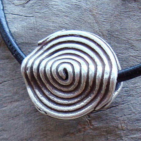 Bracelet in sterling silver on a leather band