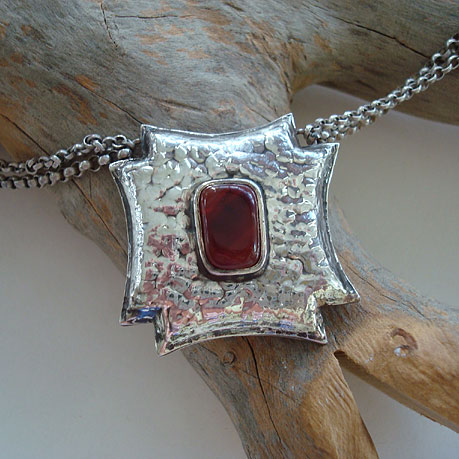 Repousse Pendant in sterling silver with a carnelian
