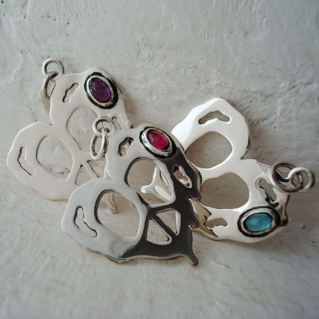 Peace Hearts in sterling silver with various gemstones