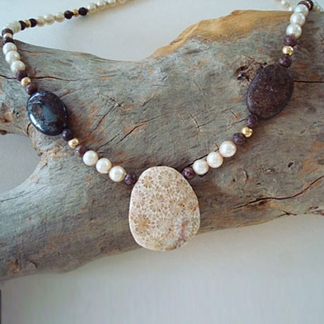 Freshwater Pearl Necklace with a fossil coral bead, gold beads and bronzites