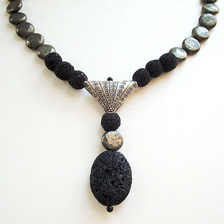 Necklace with pyrites, lava stones and sterling silver center piece
